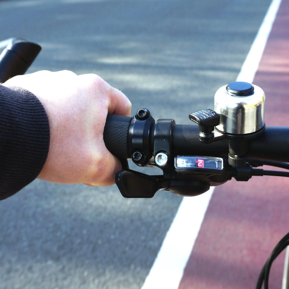 Abbildung von Fahrradlenker mit Klingel.