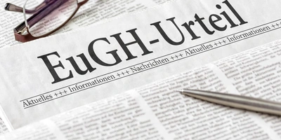 Zeitung mit der Aufschrift EuGH-Urteil